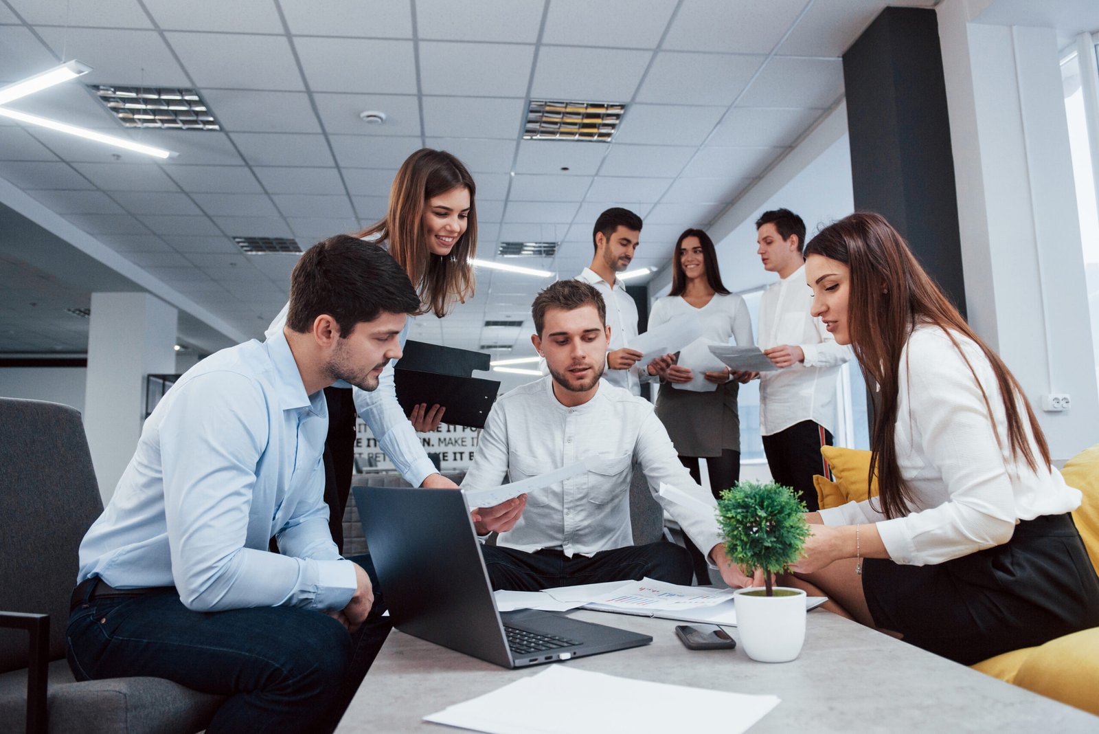 making business plan. group of young freelancers in the office have conversation and smiling